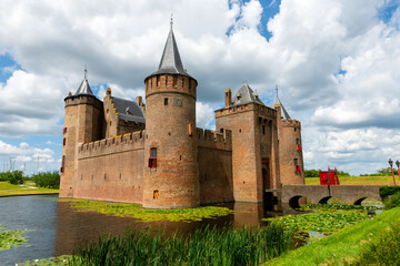 The Muiderslot Castle with moat in Muiden - 521646968