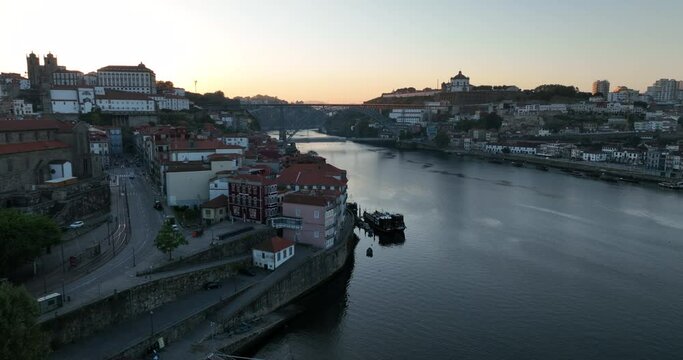 Porto Portugal Aerial View. Dom Luis Bridge at Sunrise. Porto, Portugal. Cityscape of Downtown Touristic Ribeira. Olt Town. Douro River.