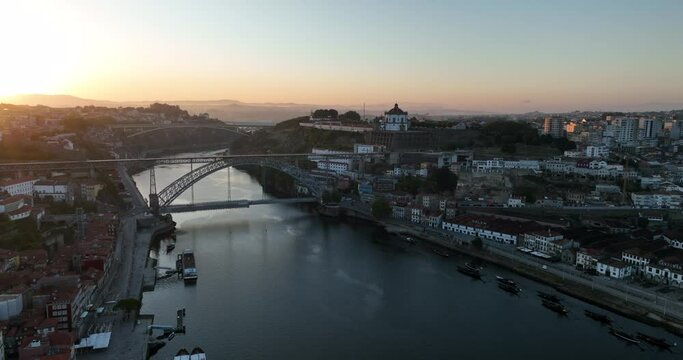 Porto Portugal Aerial View. Dom Luis Bridge at Sunrise. Porto, Portugal. Cityscape of Downtown Touristic Ribeira. Olt Town. Douro River.