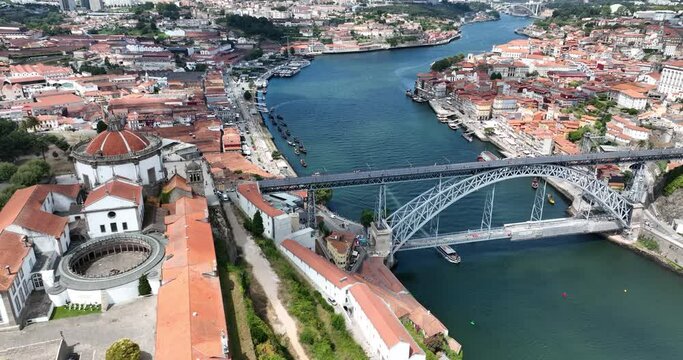 Porto Portugal Aerial View. Dom Luis Bridge at Sunrise. Porto, Portugal. Cityscape of Downtown Touristic Ribeira. Olt Town. Douro River.