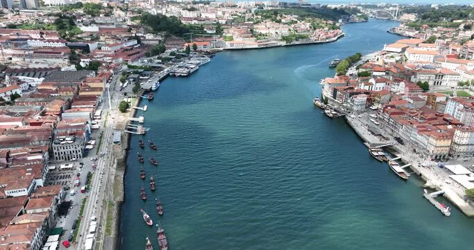Porto Portugal Aerial View. Dom Luis Bridge at Sunrise. Porto, Portugal. Cityscape of Downtown Touristic Ribeira. Olt Town. Douro River.