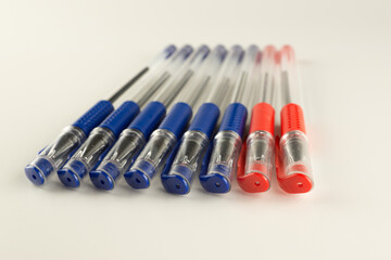 Naklejka premium set of blue ballpoint pens lined up hardly
