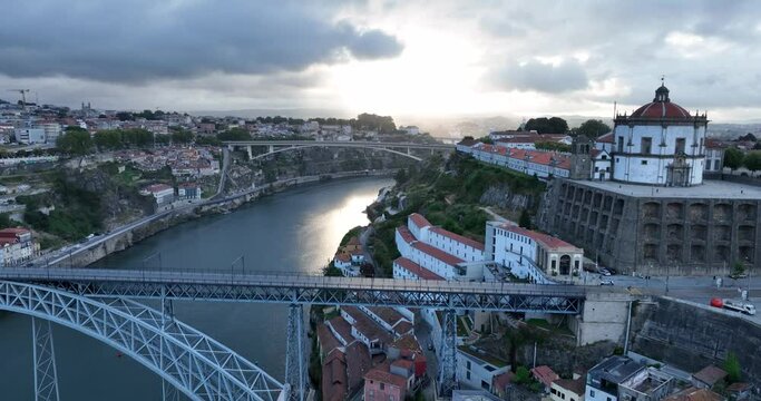Porto Portugal Aerial View. Dom Luis Bridge at Sunrise. Porto, Portugal. Cityscape of Downtown Touristic Ribeira. Olt Town. Douro River.