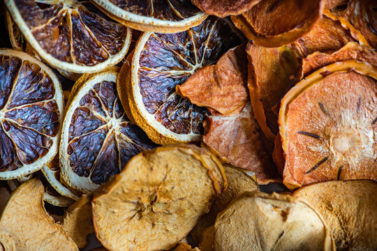 Close-Up of dried apple, orange and persimmon chips