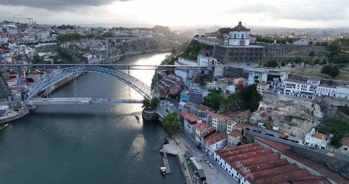 Porto Portugal Aerial View. Dom Luis Bridge at Sunrise. Porto, Portugal. Cityscape of Downtown Touristic Ribeira. Olt Town. Douro River.