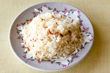 Traditional delicious Turkish food; Turkish style rice pilaf (Turkish name; Arpa sehriyeli. tavuklu, kuru fasulyeli, kavurmali pirinc pilavi)