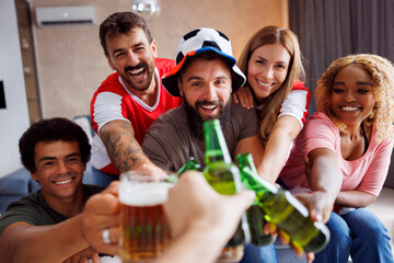 Football fans making a toast while watching world championship game
