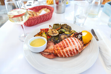 Grilled vegetables and squid, calamari served in Greek tavern, traditional greece food