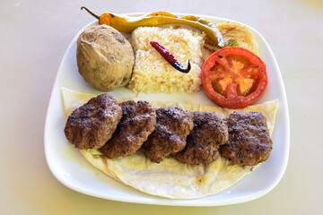 Meatball between bread (Turkish name : ekmek arasi kofte ) Izgara kofte. Manisa, Akcaabat, Akhisar  kofte