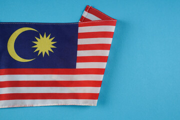 Fototapeta premium Malaysia Flag on blue background 