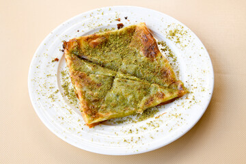 Turkish Dessert Sobiyet  Baklava, mussels baklava and classic baklava with Pistachio . Cevizli, Fistikli Baklava, top view.