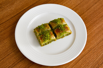 Turkish Dessert Sobiyet  Baklava, mussels baklava and classic baklava with Pistachio . Cevizli, Fistikli Baklava, top view.