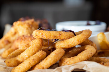 fried onion rings with other products in the cafe