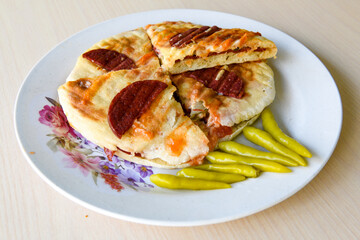Turkish karisik atom  tost ( kasarli bazlama tost) . Sucuklu, Kasarli, kavurmali karisik Ayvalik tost. Flat baked bread toasted