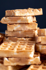 soft sweet waffles on the table, close up