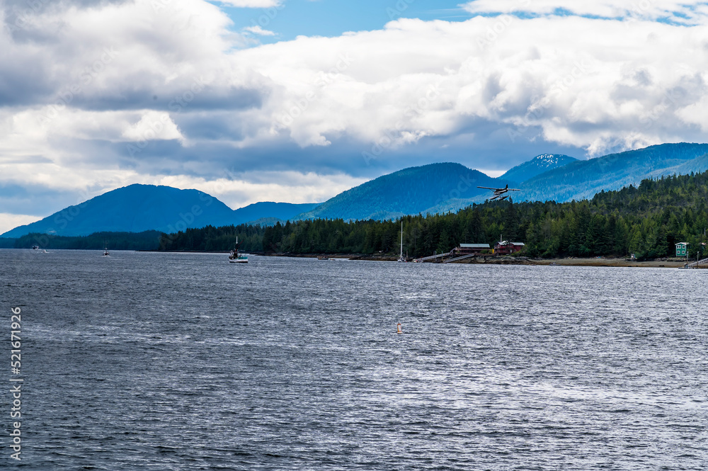 Wall mural A view down the inside passage past Pennock island from Ketchikan, Alaska in summertime