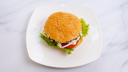 Beef tombik doner kebab in plate top view isolated