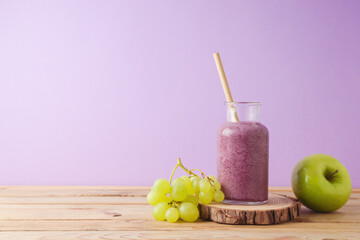 Blueberry smoothie on wooden table. Detox and diet concept