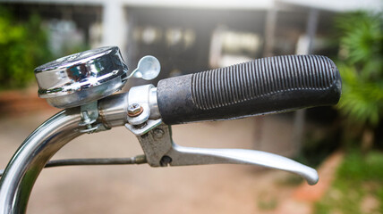 Close up retro black bicycle handlebar grip