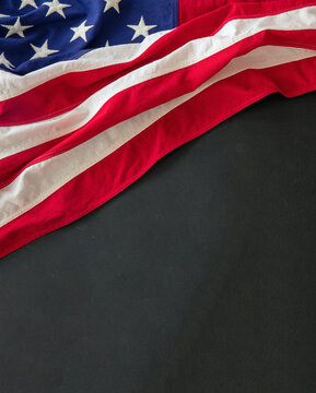 USA Flag On Black Background, Copy Space. American Holiday Template, Overhead