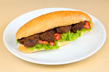 Meatball between bread (Turkish name : ekmek arasi kofte ) Izgara kofte. Manisa, Akcaabat, Akhisar  kofte