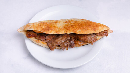 Beef doner kebab in plate top view isolated
