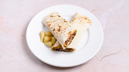 Beef durum kebab in plate. Beef lavash doner kebab