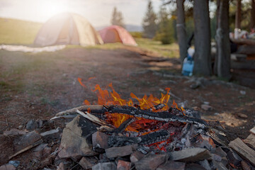 Close up of fire place in camping site on top pf mountain. Beautiful view. Bonfire concept.