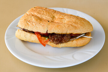 Meatball between bread (Turkish name : ekmek arasi kofte ) Izgara kofte. Manisa, Akcaabat, Akhisar  kofte