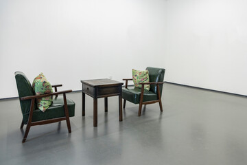 Green leather chairs in the interior