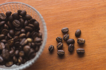 coffee beans on wooden spoon