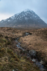 Majestic landscape Winter portrait ofn Stob Dearg Buachaille Etive Mor mountain and snowcapped peak in Scottish Highlands © veneratio
