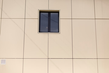 Window in wall of building. Architecture details. Facade of house.