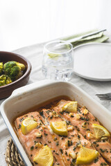 Baked salmon loins with olive oil, honey and garlic. Mediterranean and healthy cuisine