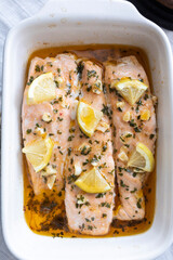 Baked salmon loins with olive oil, honey and garlic. Mediterranean and healthy cuisine