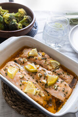 Baked salmon loins with olive oil, honey and garlic. Mediterranean and healthy cuisine