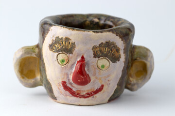 handmade porcelain flowerpot with face