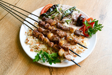 Chicken wings barbeque in a dish with BBQ grill sauce . Izgara tavuk kelebek sis kanat. Tavuk sis, gogus.