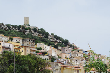 Sardinian village of Posada with the Castello della Fava tower. Sardinia, Italy