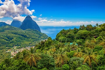 St. Lucia island with green hills, rocks, and tropical forests near the sea, the Caribbean