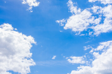 Naklejka na ściany i meble Beautiful White Clouds in Blue Sky