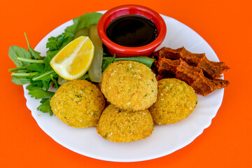 Fried Chicken breast hot crispy strips crunchy chicken tenders  isolated on white background.Nuggets isolated on white background on a plate