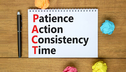 PACT patience action consistency time symbol. Concept words PACT patience action consistency time on white note, wooden background. Business PACT patience action consistency time concept. Copy space.