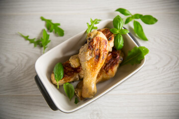 grilled chicken legs fried with spices and herbs