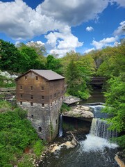 Lanterman's Mill at Mill Creek Park in Ohio with clouds