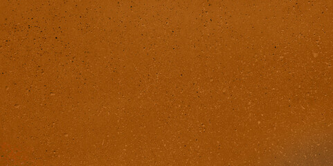 dotted brown stone texture background. orange natural porous stone texture, simple background...