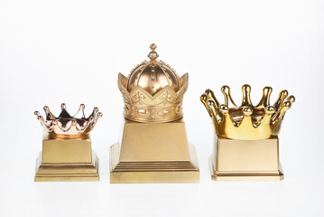 golden crown on stand isolated on white background