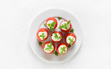 Tomatoes stuffed with cream cheese