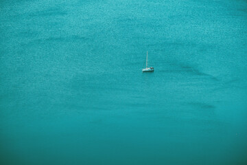 A yatch on blue sea at Balikesir Ayvalik Turkey.