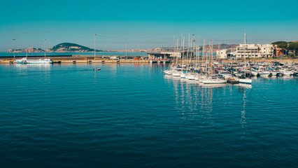 Port of formia, boats and fishing boats stationary - 521708313